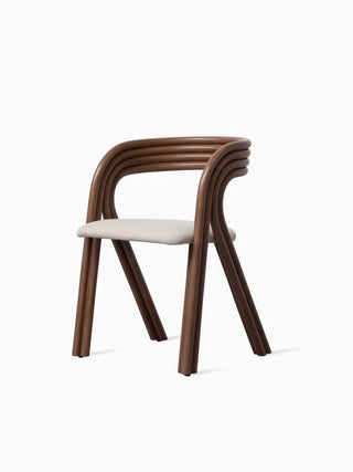 Vincent Sheppard Arc Dining Chair in tabaksgebeitst rotan, schuin vooraanzicht