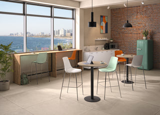 Buronomic Détente rectangular and round high tables set up together