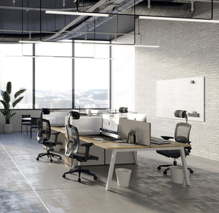 Lifestyle image of Buronomic Optimax EVO towers in white and Nebraska by workstations, concrete ceiling