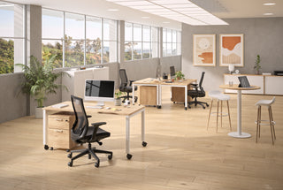 Lifestyle image of Buronomic Quietude 72 cm sliding door cabinets in Nebraska and white in a bright office